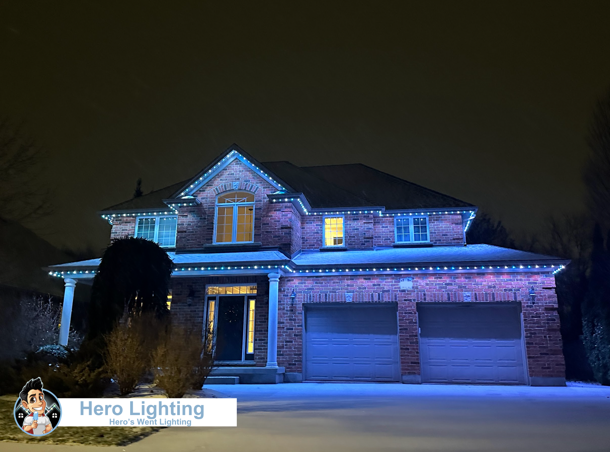 Blue and white LED lights on home in winter