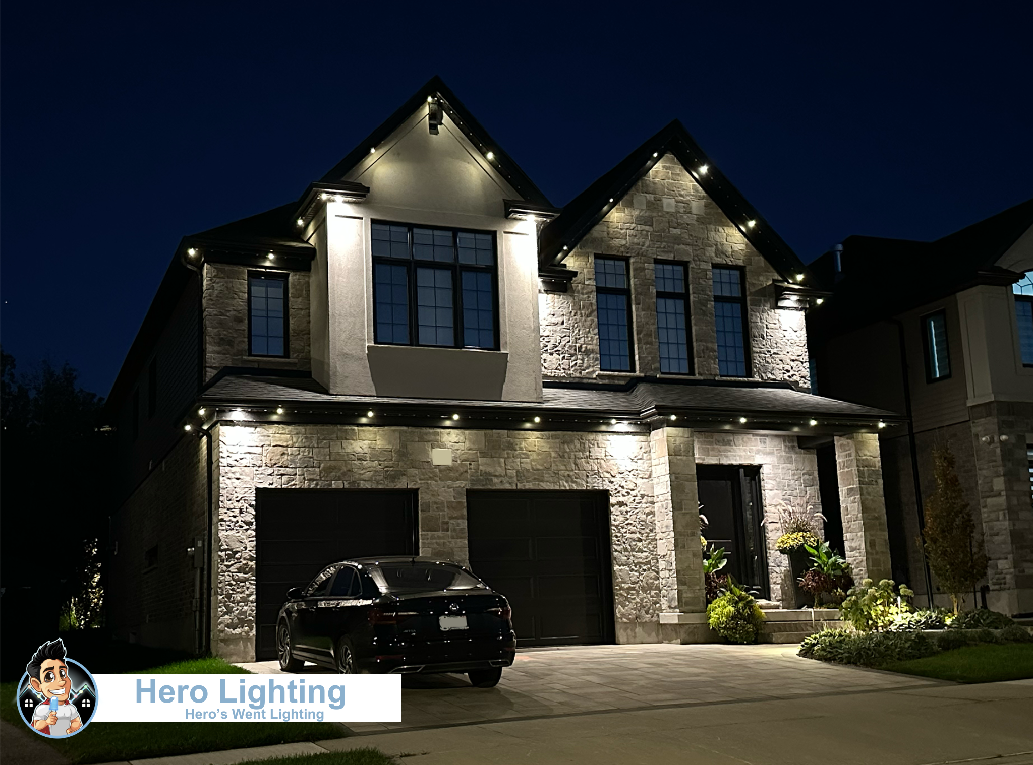 LED lighting on stone home at night